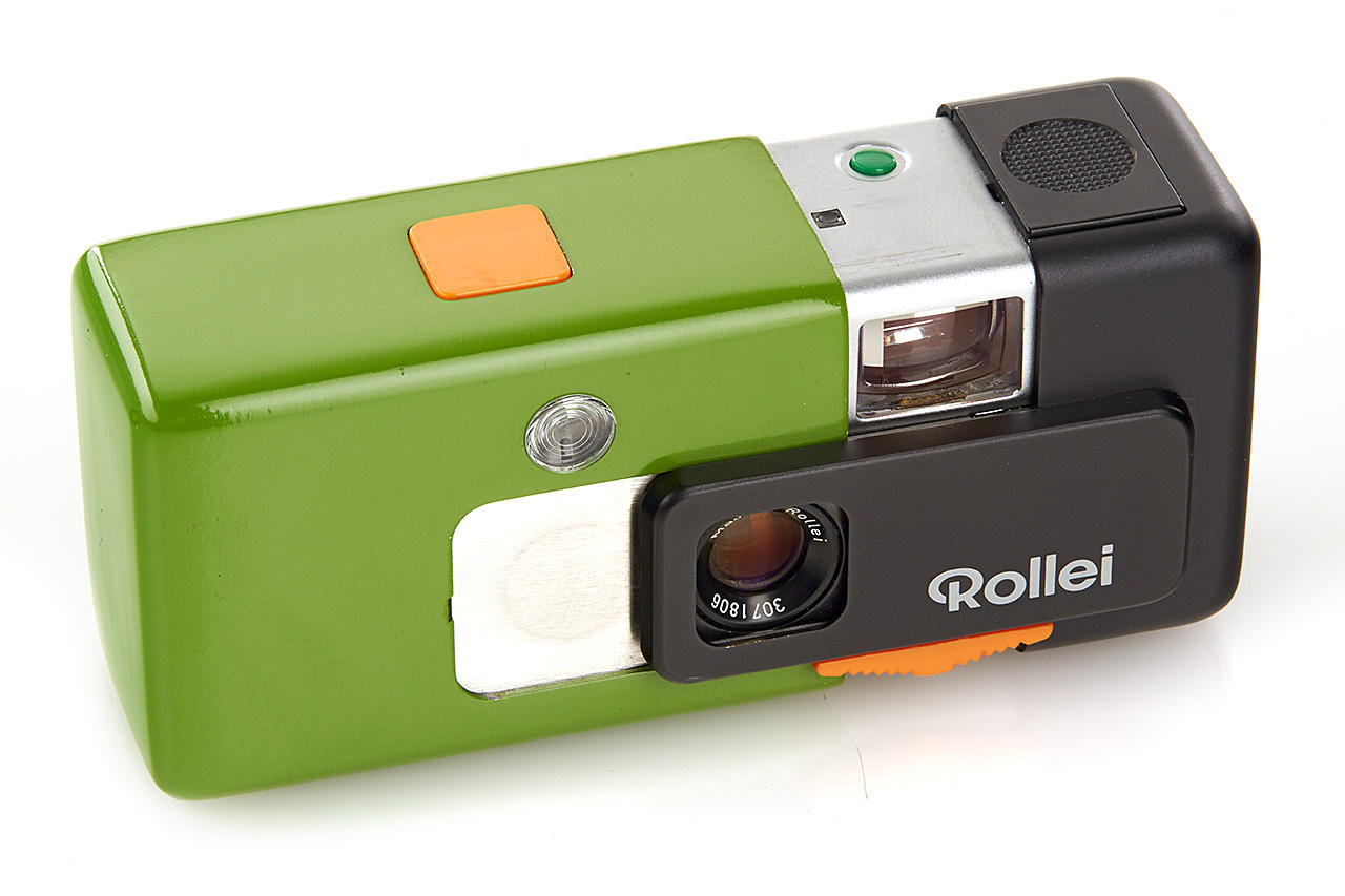 A Cased Mid 20thC Rollei A110 Subminiature Camera, With A Flash Cube Adapter Holding Chain Soft A Cased Mid 20thC Rollei A110 Subminiature Camera, With A Flash Cube Adapter Holding Chain Soft