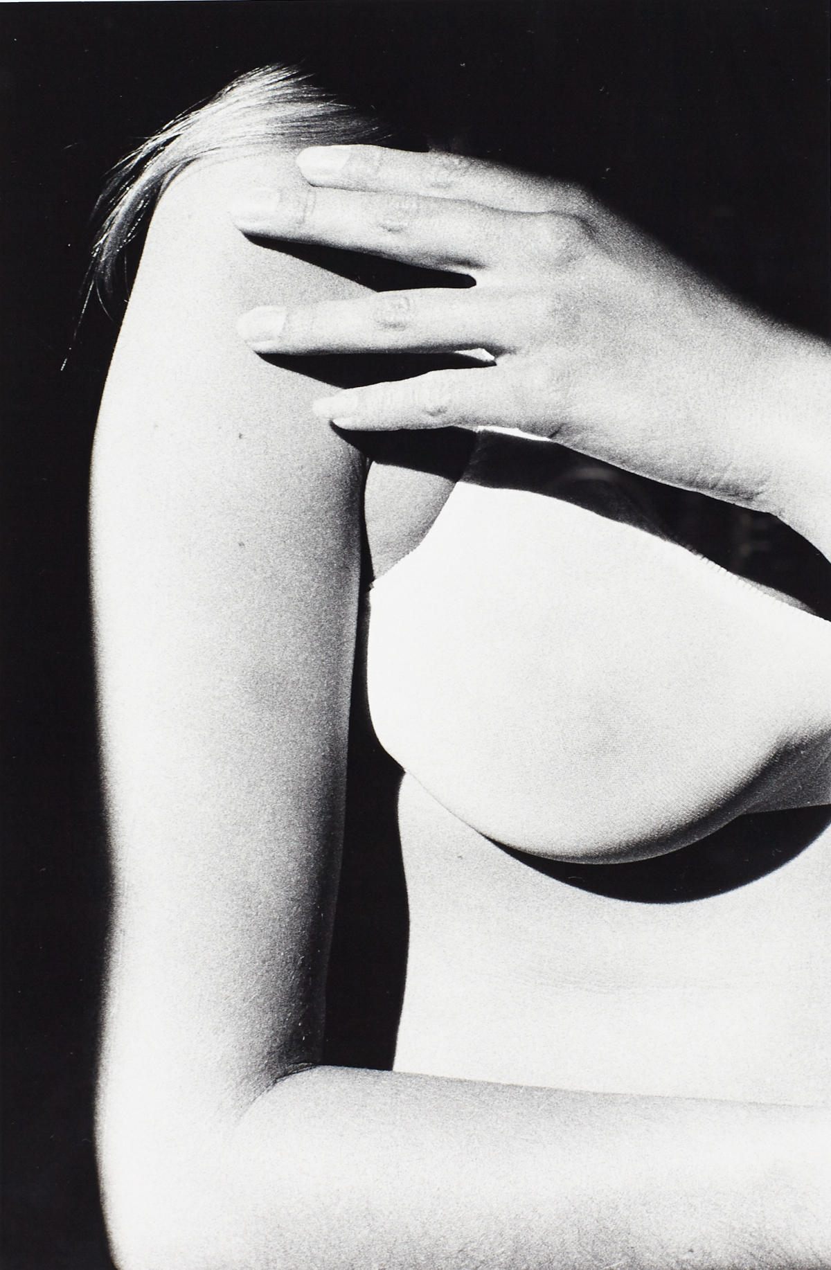 RALPH GIBSON (* 1939) ‘Woman's Hand on Shoulder—Brassiere’ (from the portfolio ‘If & (Silk)’), 1975