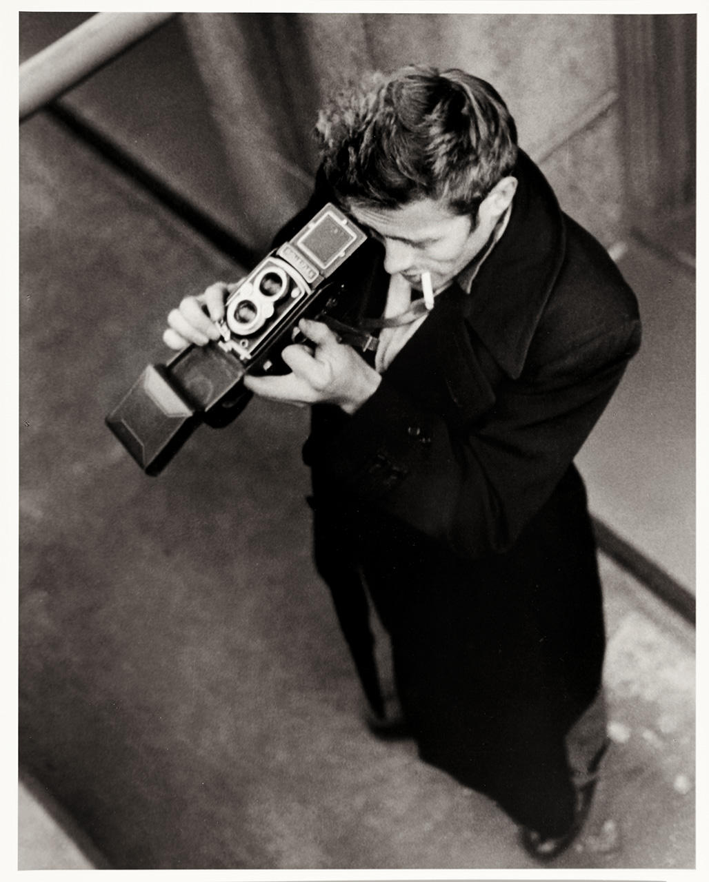 ROY SCHATT (1909–2002) James Dean with his Rolleiflex camera, New York 1954