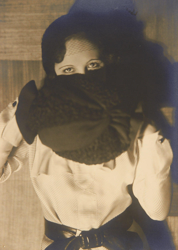 GERMAINE KRULL (1897–1985) Woman behind muff, Paris c. 1929