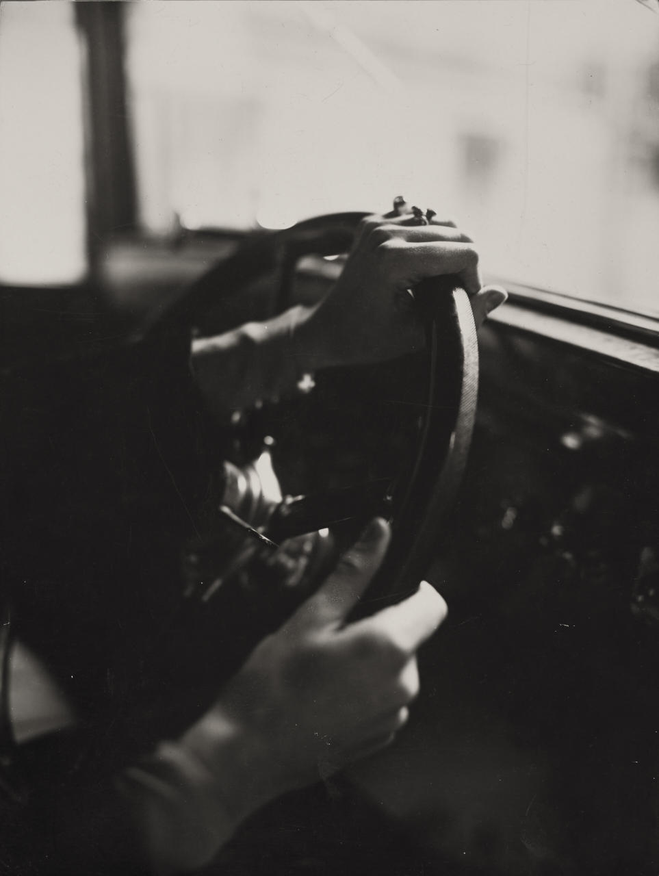 GERMAINE KRULL (1897–1985) ‘Frauenhände am Steuer’ (Female hands on steering wheel), c. 1928