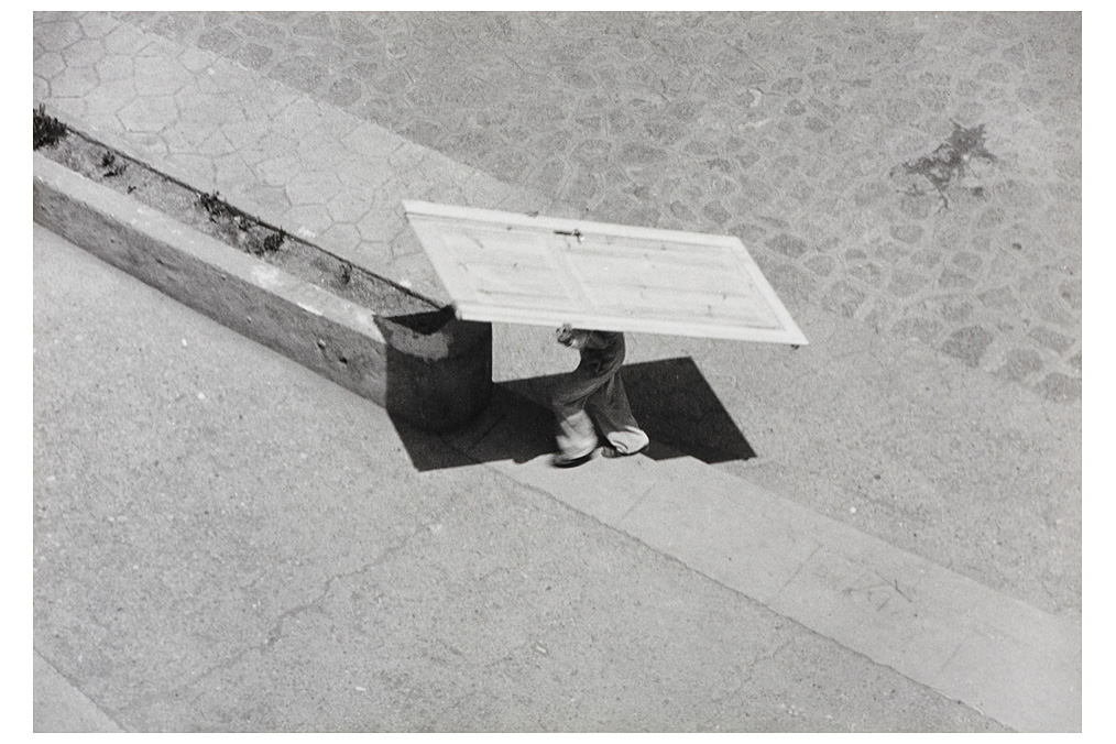 Ernst Haas, Man carrying a door Ernst Haas, Man carrying a door