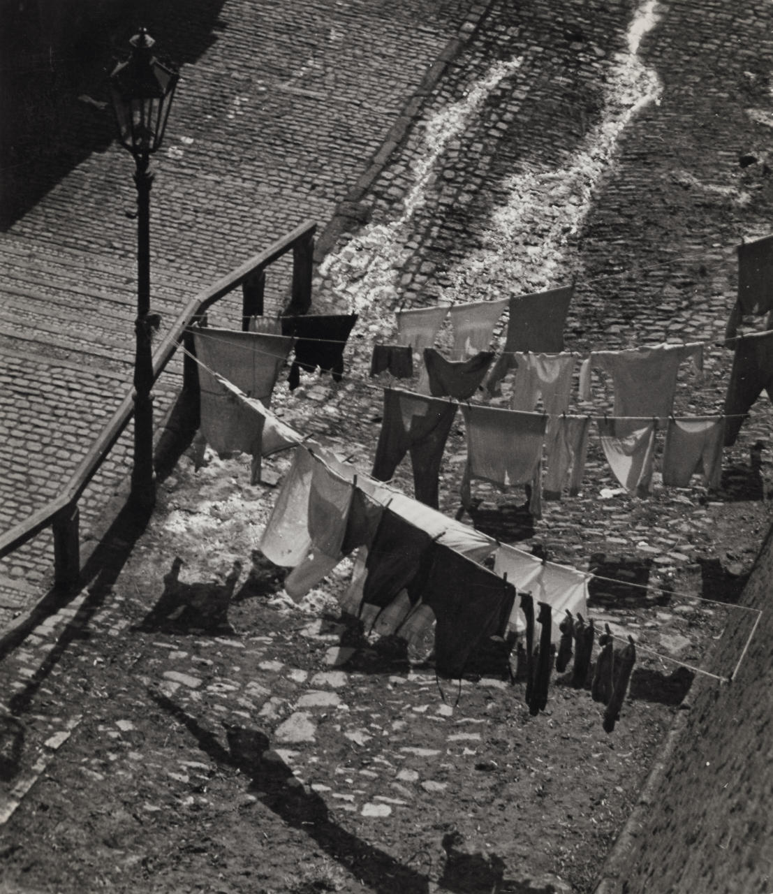 MIROSLAV HAK (1911–1978) Street scene with laundry, c. 1940s