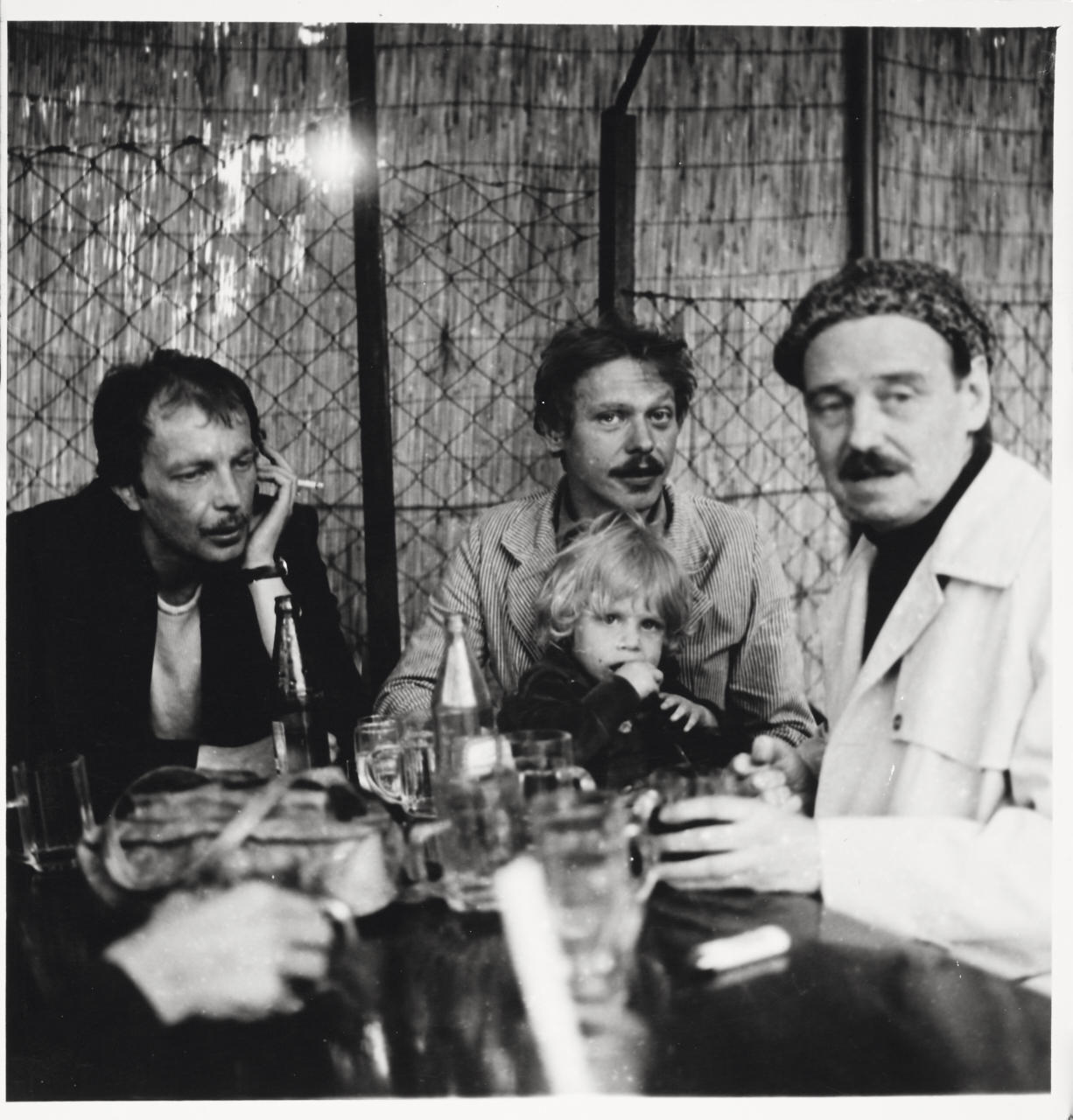 CORA PONGRACZ (1943–2003) Franz West, Reinhard & Connie Priessnitz, Otto Kobalek beim Heurigen, Vienna c. 1977