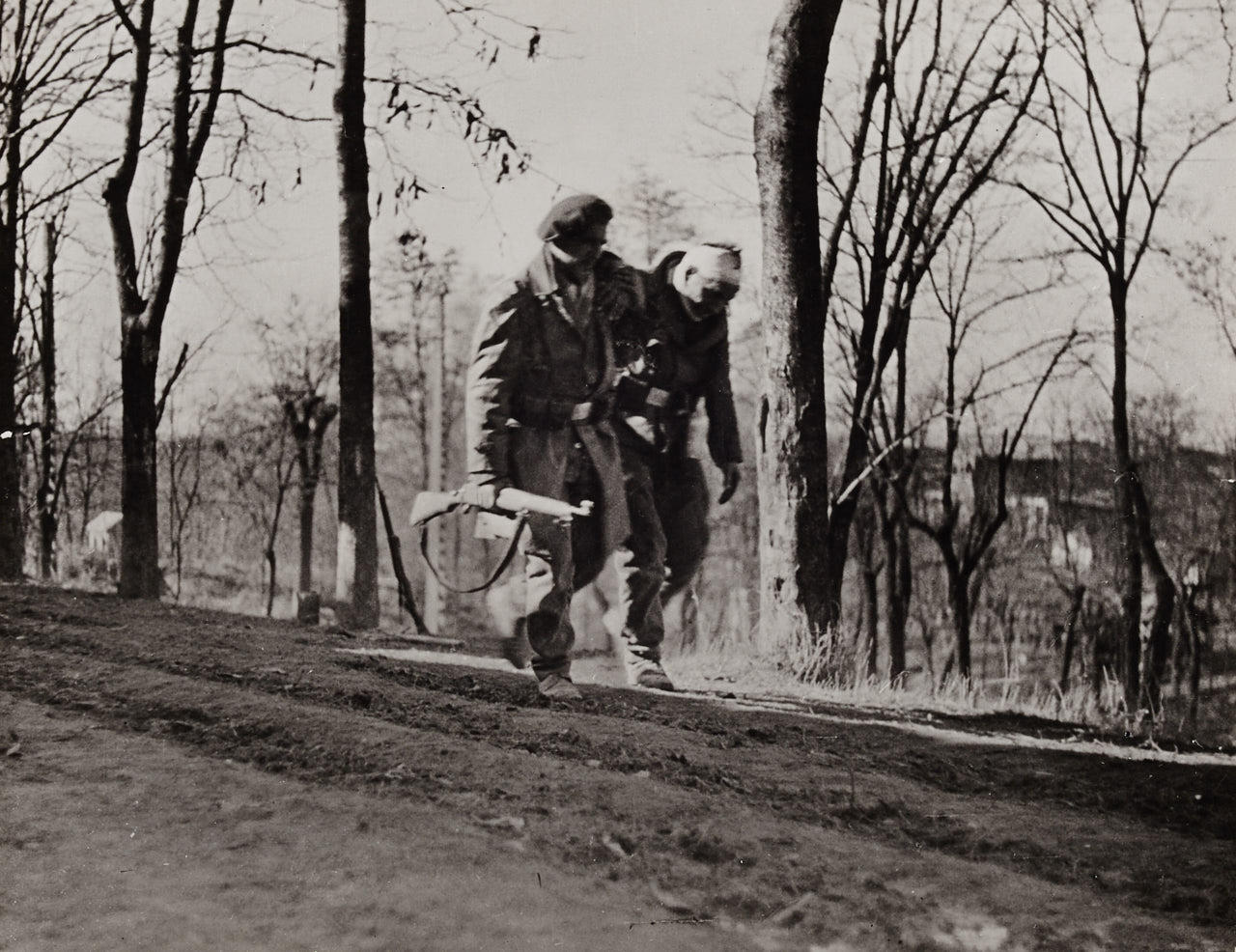 ROBERT CAPA (1913–1954) Wounded Loyalist, Madrid 1936