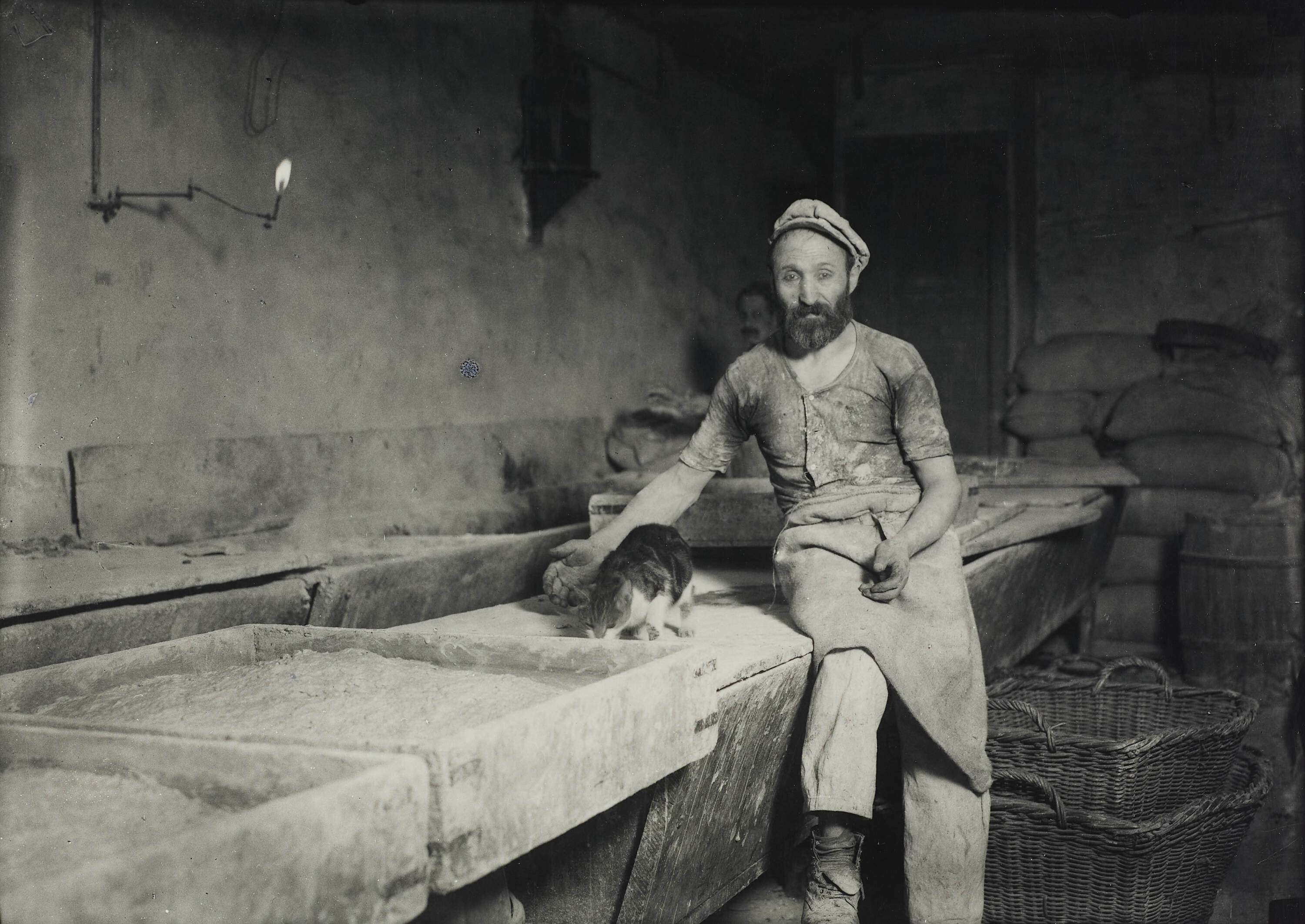 LEWIS HINE (1874–1940) - Baker with cat, Lower East Side, NYC 1910*