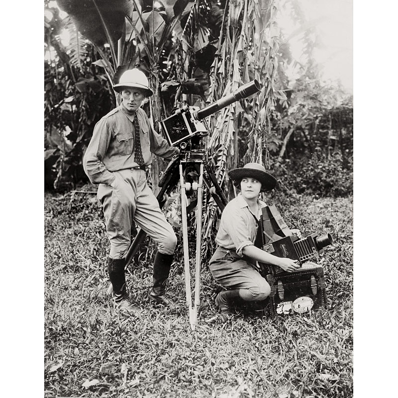 Underwood & Underwood New York, Mr. & Mrs. Lou Hutt with Graflex R.B. and film camera