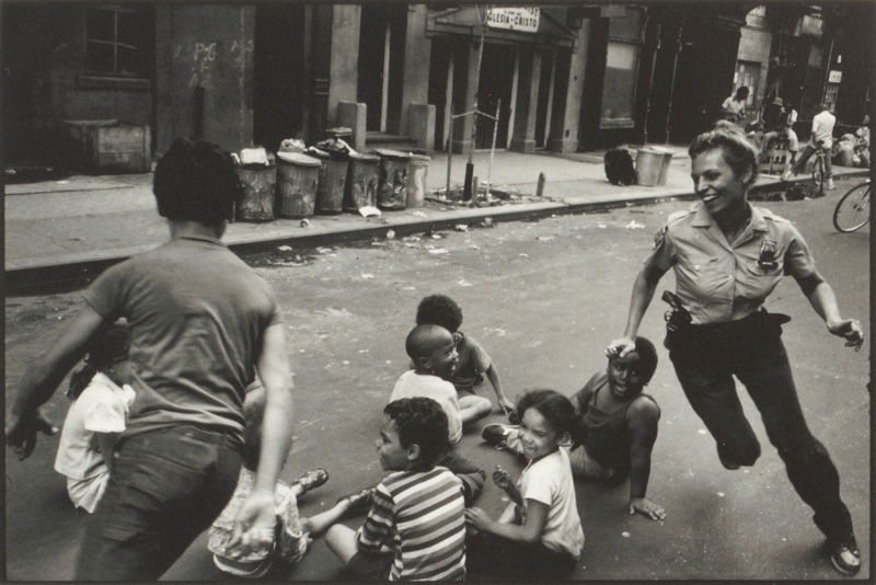 Police woman playing with kids, Leonard Freed (1929-2006)