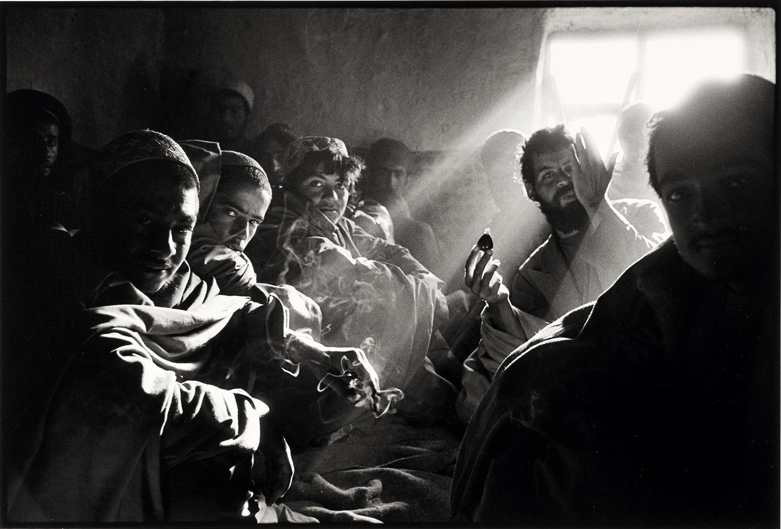 JOSEF POLLEROSS (* 1963) Refugees on the way to Kaudakar, Chai Tea House, Afghanistan 1988