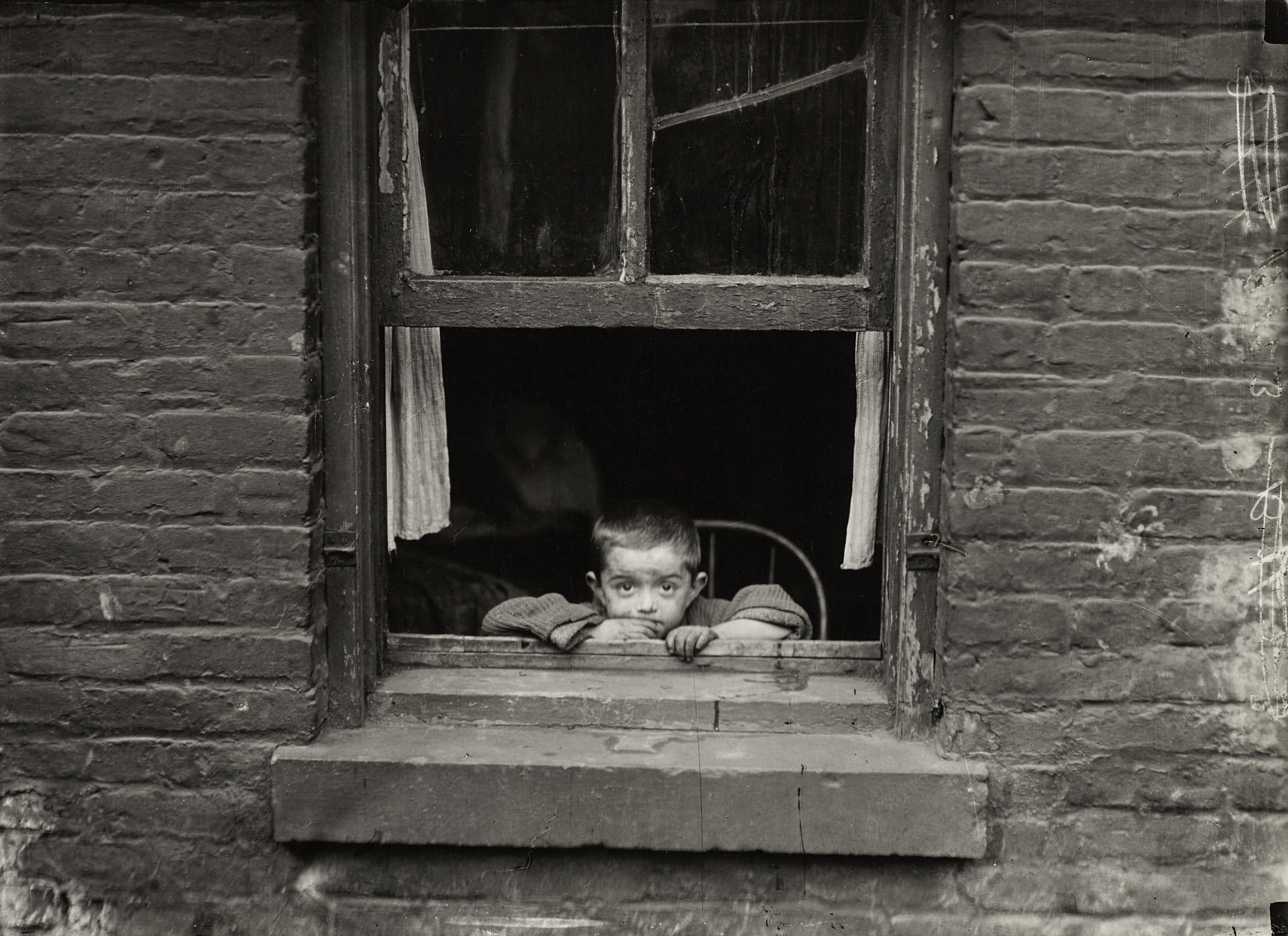 LEWIS HINE (1874–1940) Child at window, c. 1910 LEWIS HINE (1874–1940) Child at window, c. 1910