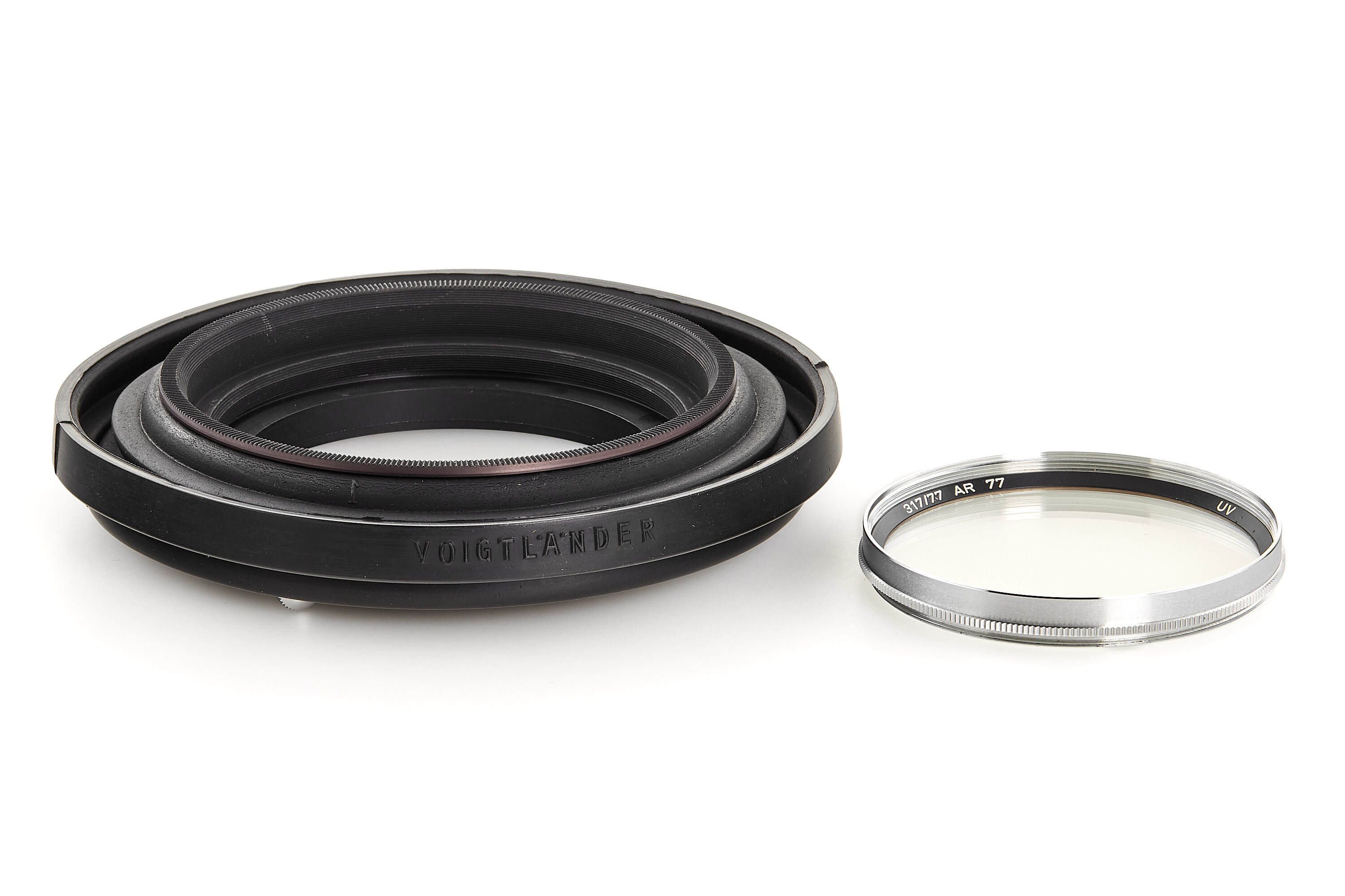 Voigtländer  Zoomar 2.8/36-82mm *