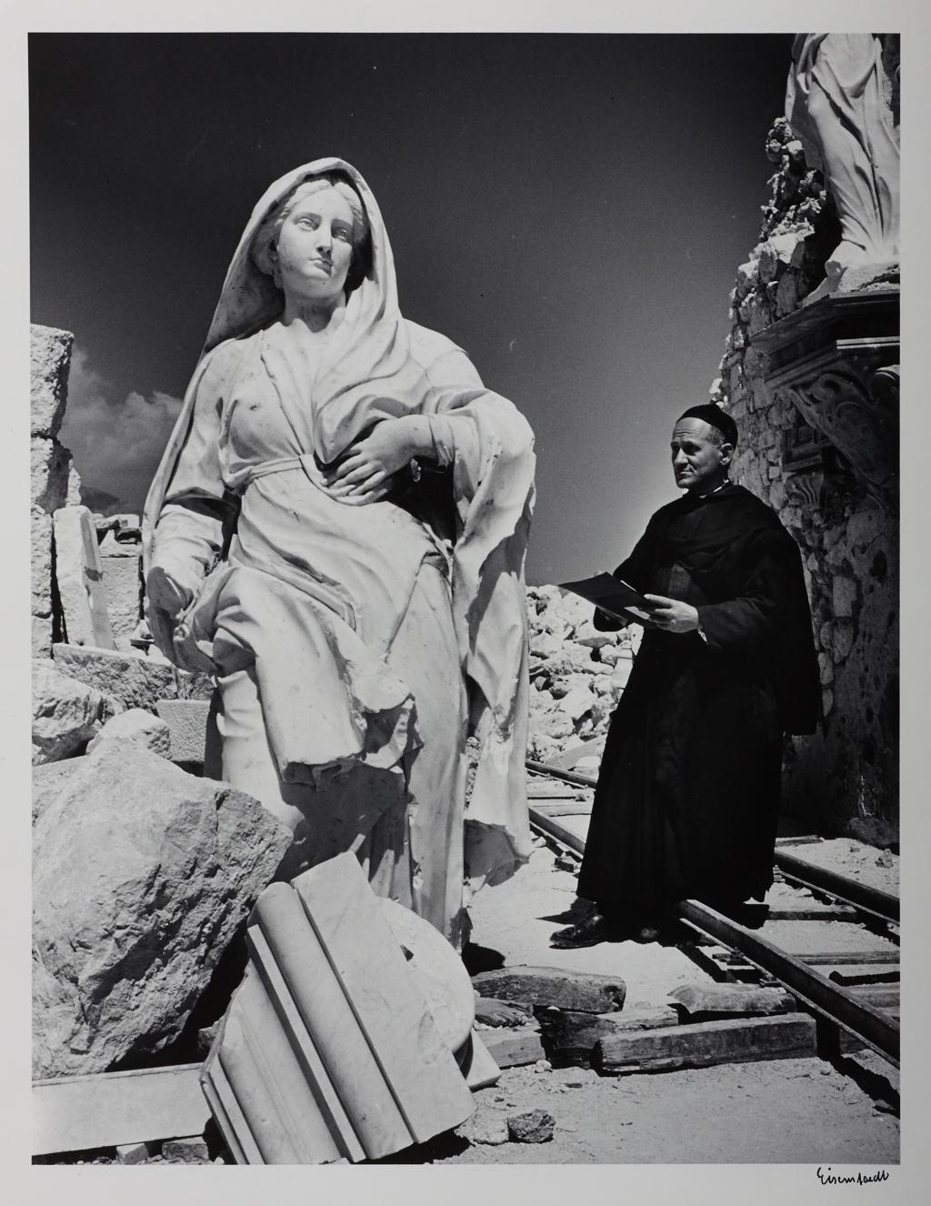 ALFRED EISENSTAEDT (1898–1995) ‘A monk surveys the damage done by American bombs to the Abbey of Monte Cassino’, 1947