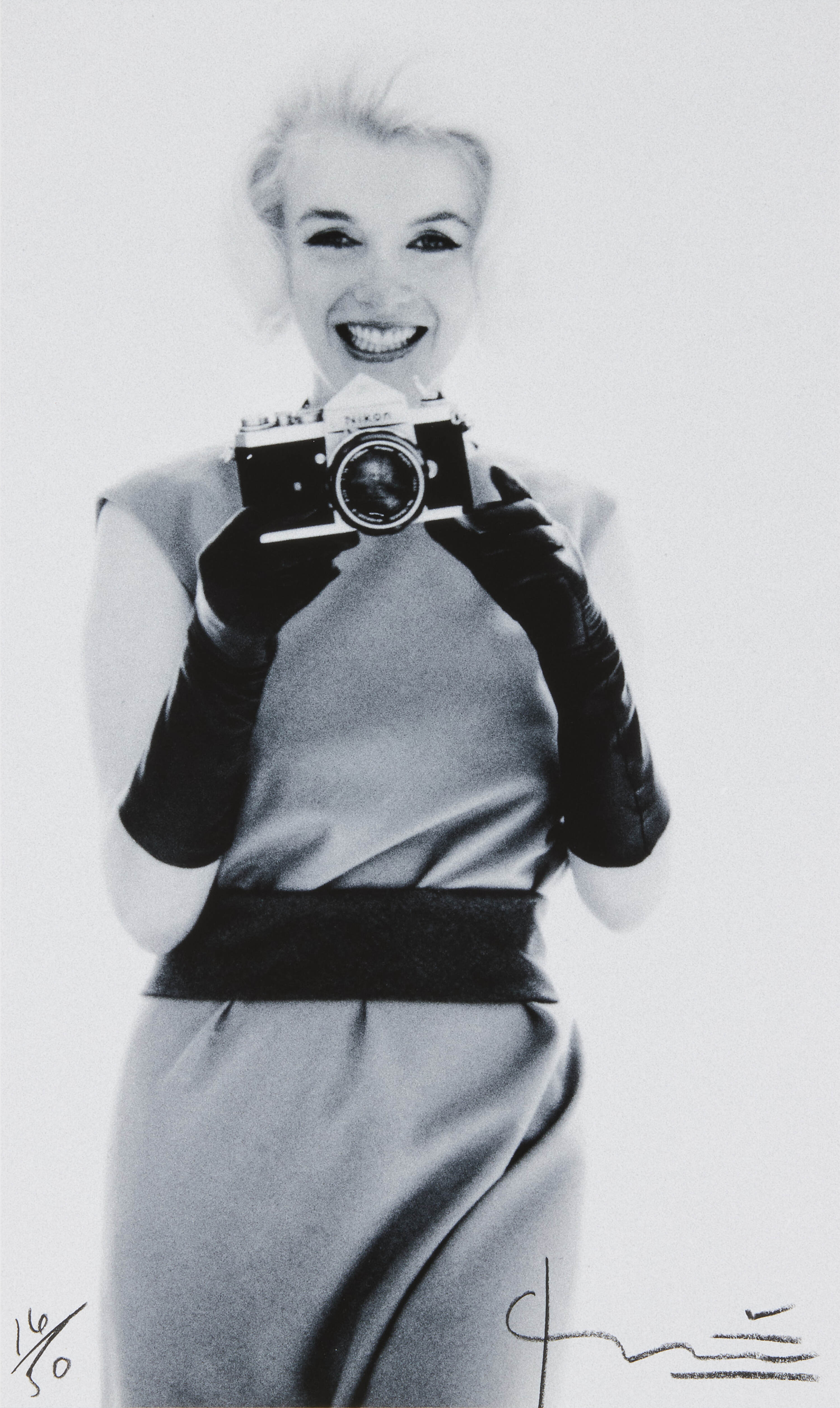 BERT STERN (1929–2013) - 'Marilyn Monroe with Nikon', 1962