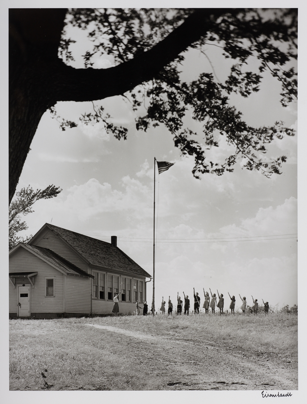 ALFRED EISENSTAEDT (1898–1995) ‘Students in Polk County, Iowa, raising the flag’, 1943