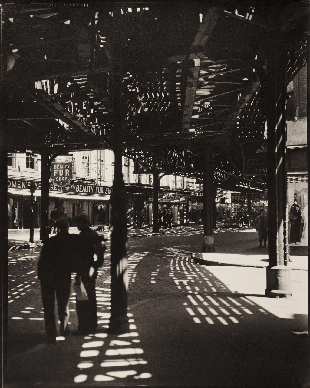 BERENICE ABBOTT (1898–1991) ‘EI, Second and Third Avenue Lines, Bowery District’, Manhattan 1936
