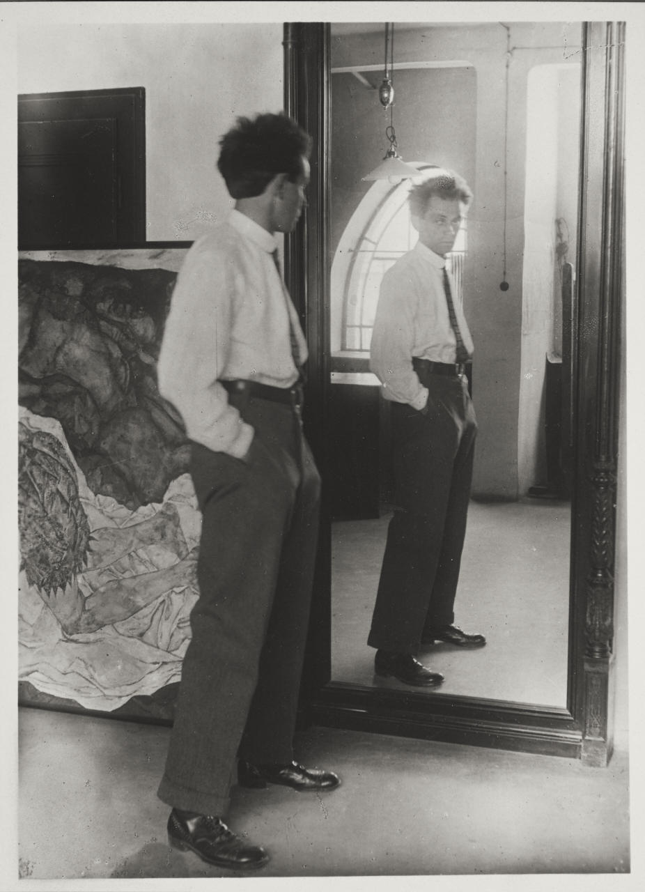 JOHANNES FISCHER (1888-1955) Egon Schiele in front of large studio mirror, Vienna 1915