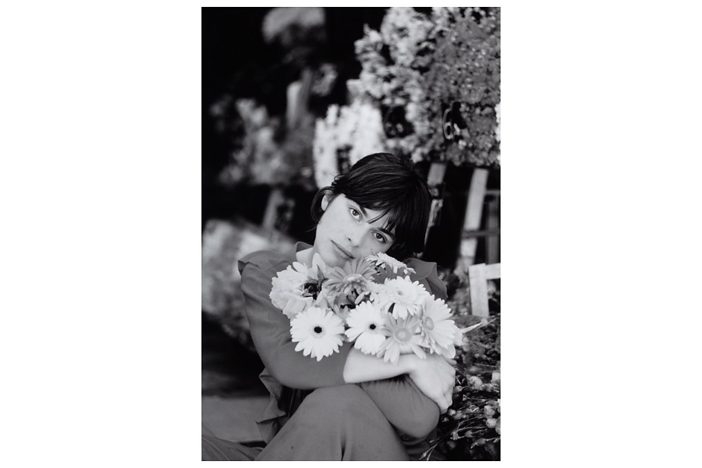Nastassja Kinski with flowers, Ken Regan