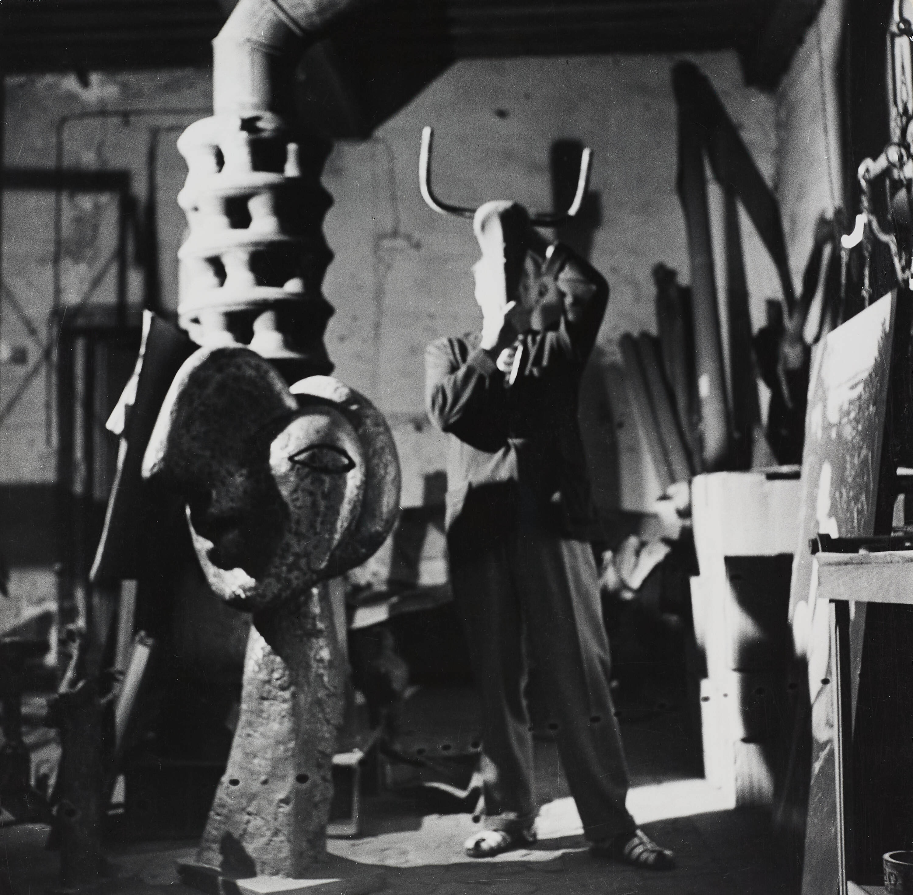 ROBERT CAPA (1913–1954) - Pablo Picasso with Taurus mask in his studio, Paris 1949